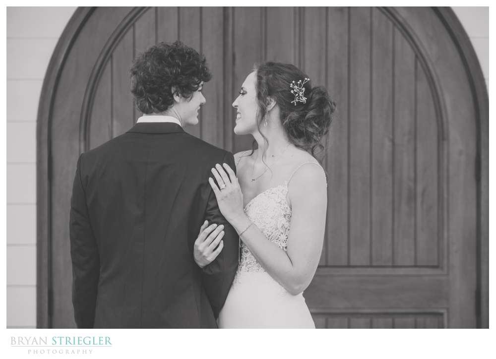 bride looking at groom